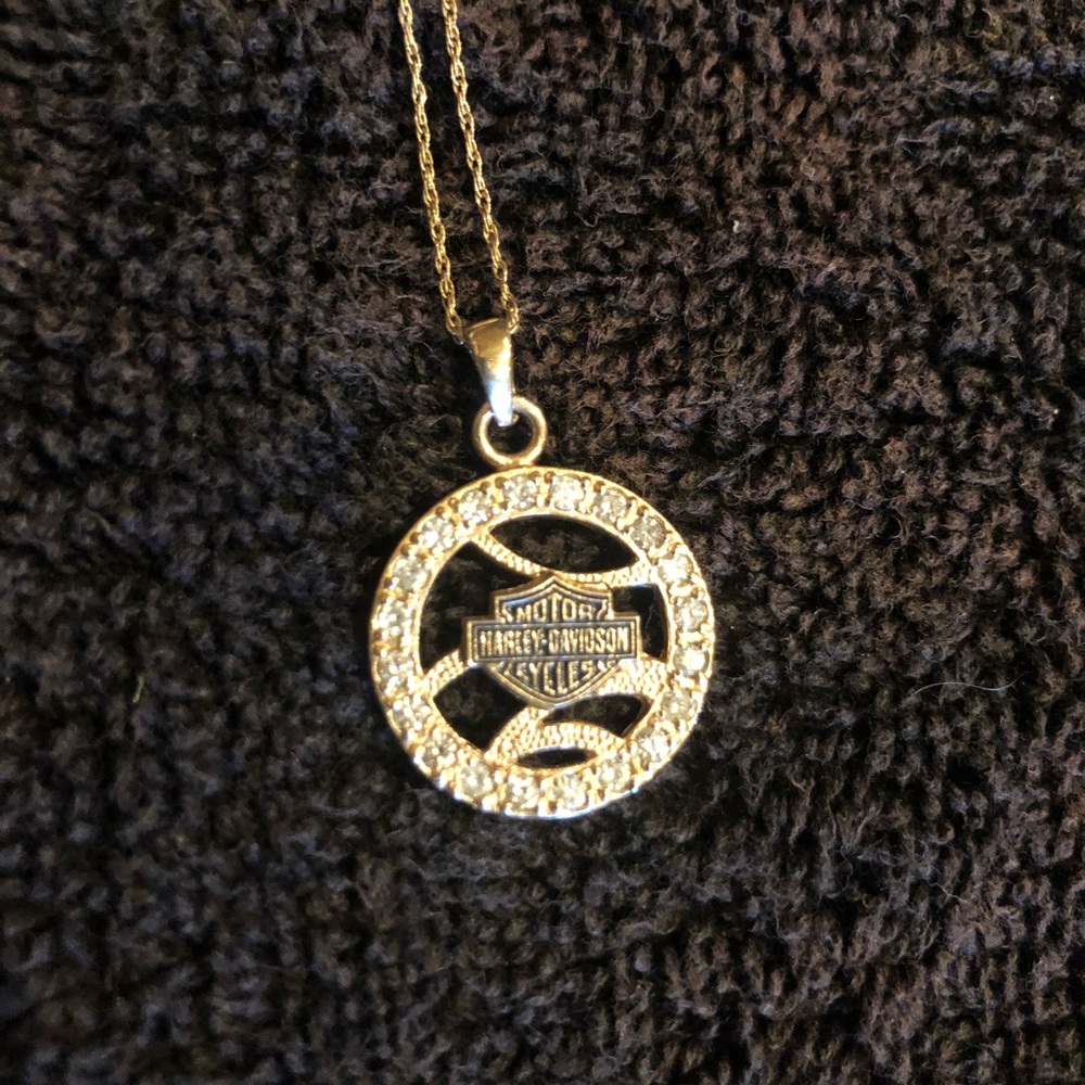 Harley Davidson necklace and diamond pendant.